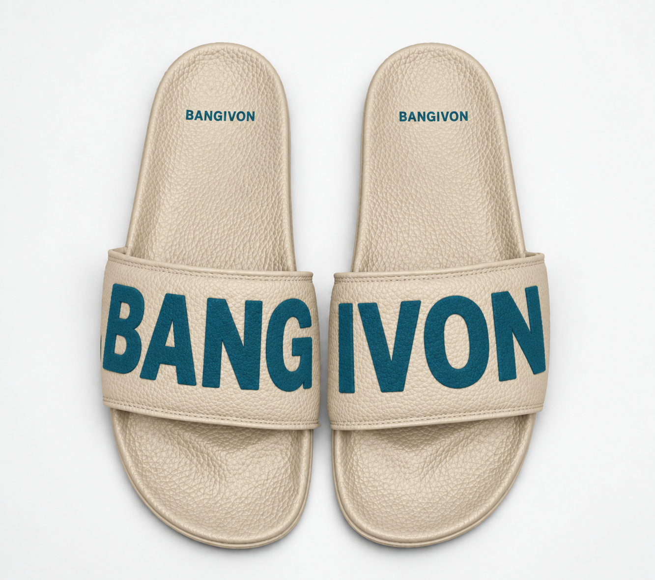 BANGIVON single-band slide sandals in Oat / Deep Teal, with BANG and IVON block lettering across the pair